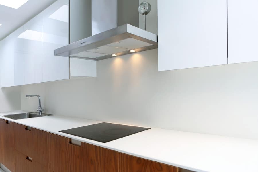 Laminate kitchen countertop being prepared for professional refinishing